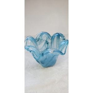 Vintage hand blown art glass with colors of turquoise.